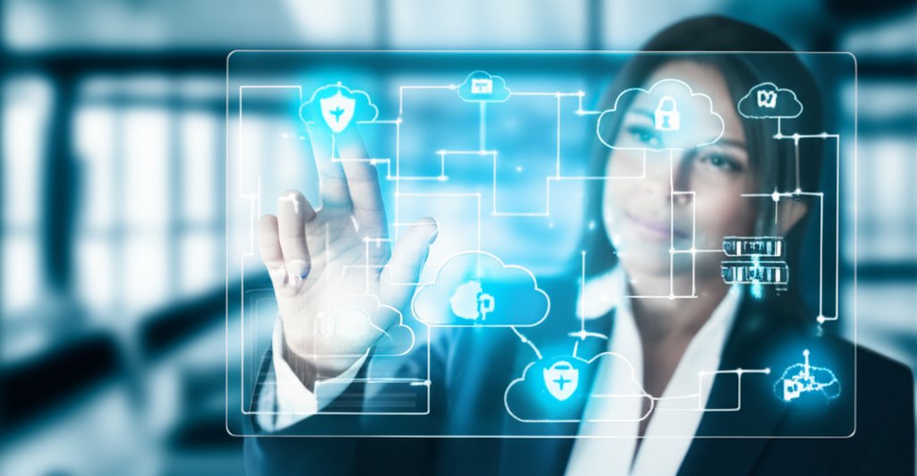 Modern professional managing serverless cloud app security on a holographic interface with shield icons.